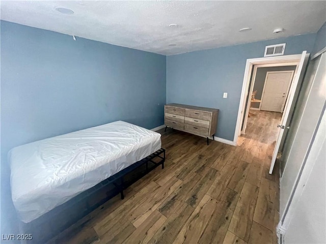 501 S Maryland Pkwy Unit C17, Las Vegas, NV 89101 - bedroom with wood finished floors and baseboards