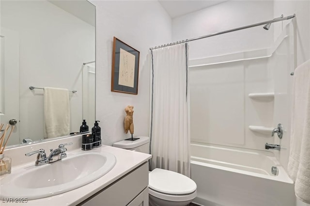 full bath with toilet, shower / bath combo, and vanity