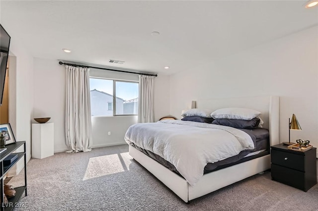 bedroom featuring carpet and recessed lighting