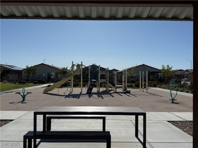community jungle gym featuring a residential view