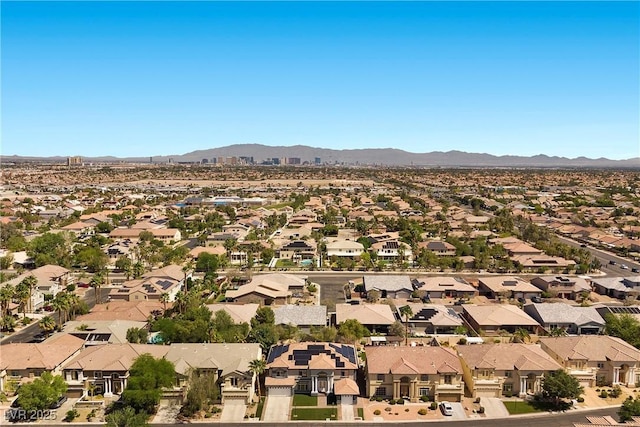 aerial perspective of suburban area featuring a mountain backdrop