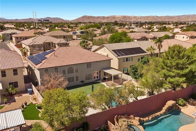 aerial perspective of suburban area featuring mountains