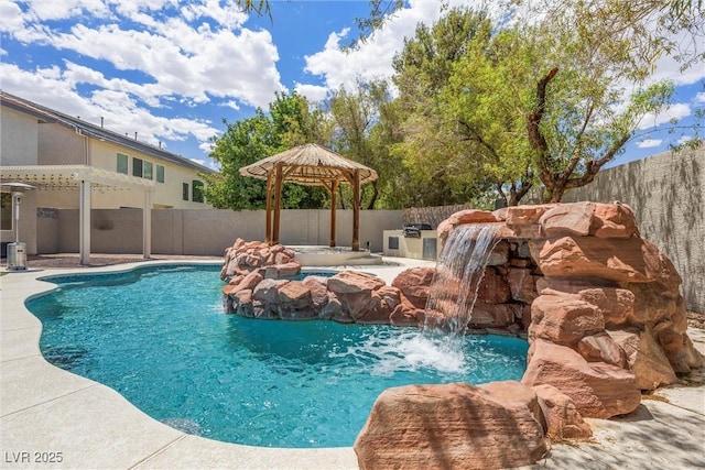 view of swimming pool featuring a fenced backyard, a jacuzzi, a patio, and a gazebo