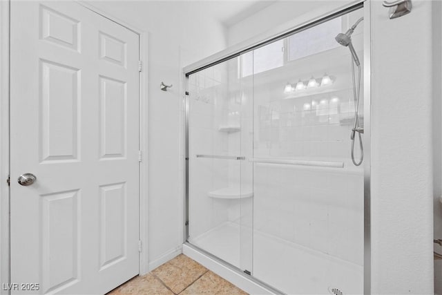 358 Whispering Tree Ave, Las Vegas, NV 89183 - bathroom featuring a shower stall and tile patterned flooring
