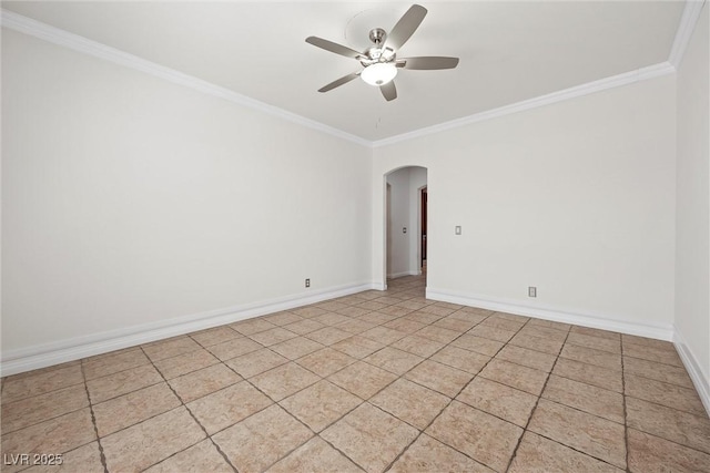 empty room featuring arched walkways, crown molding, ceiling fan, baseboards, and light tile patterned floors