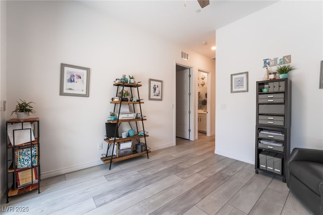 778 Dainty Daffodil St, Henderson, NV 89011 - living area featuring light wood-style flooring, baseboards, and ceiling fan