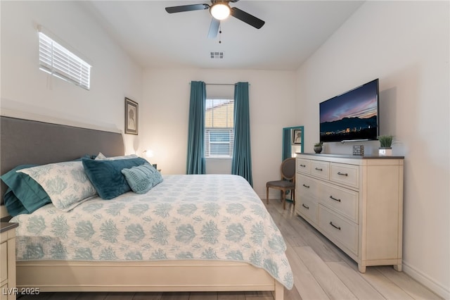 778 Dainty Daffodil St, Henderson, NV 89011 - bedroom featuring light wood-style flooring, baseboards, and ceiling fan