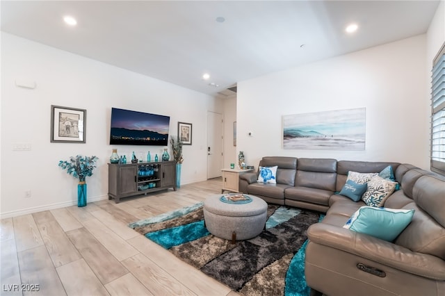 778 Dainty Daffodil St, Henderson, NV 89011 - living room featuring light wood-type flooring, recessed lighting, and baseboards
