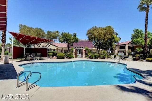 7885 W Flamingo Rd Unit 2019, Las Vegas, NV 89147 - community pool with a patio area