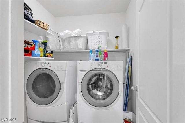washroom with washer and clothes dryer