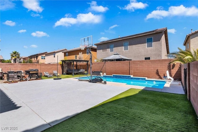 view of pool with a patio area and a gazebo