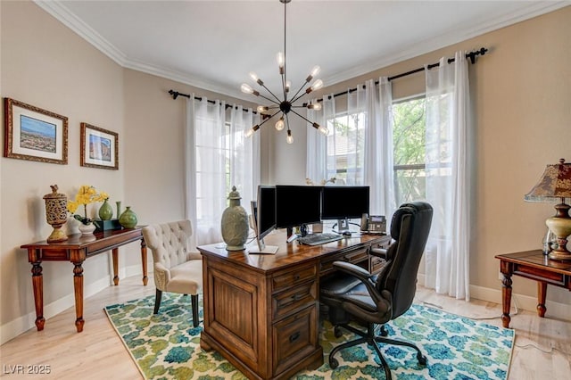 office space with a chandelier, crown molding, baseboards, and light wood-style floors
