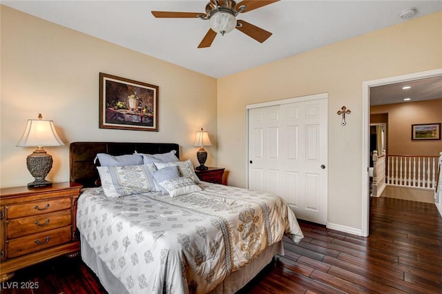 bedroom with wood finished floors, baseboards, ceiling fan, recessed lighting, and a closet