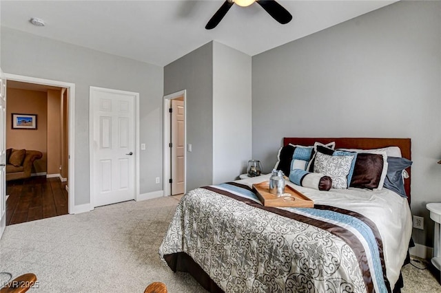 bedroom featuring carpet, baseboards, and ceiling fan