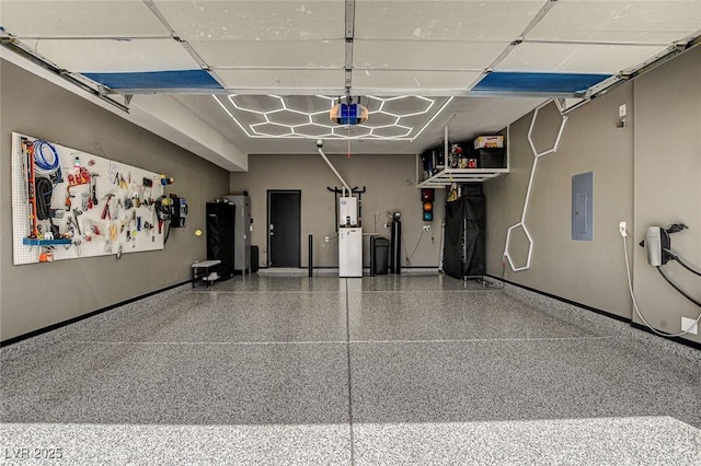 garage with a garage door opener, electric panel, and baseboards