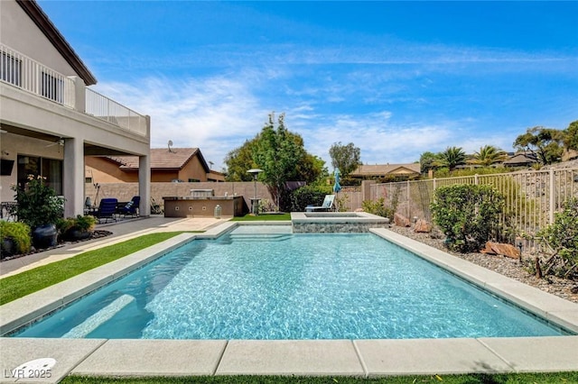 view of swimming pool featuring an in-ground hot tub, a fenced backyard, a patio area, and area for grilling