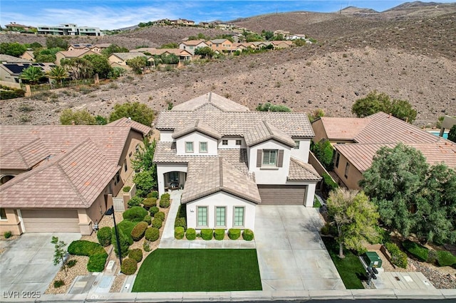 aerial perspective of suburban area featuring mountains