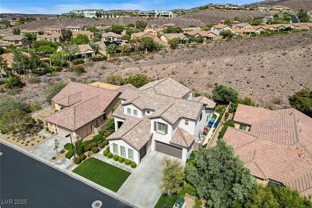 aerial view of residential area with a mountain backdrop