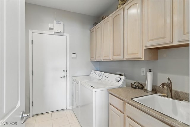 2612 Dearport Ct, Henderson, NV 89052 - laundry area featuring cabinet space, washing machine and clothes dryer, and light tile patterned floors