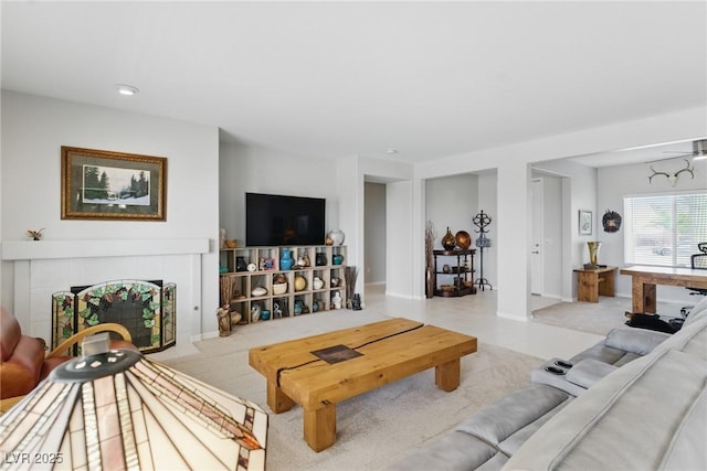 2612 Dearport Ct, Henderson, NV 89052 - living area with a tiled fireplace and baseboards