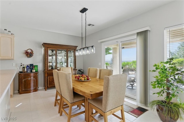 2612 Dearport Ct, Henderson, NV 89052 - dining space with healthy amount of natural light and light tile patterned flooring
