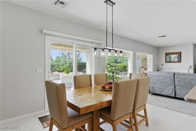 2612 Dearport Ct, Henderson, NV 89052 - dining area featuring plenty of natural light, baseboards, and light tile patterned floors