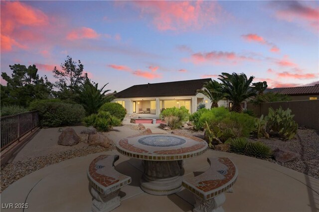 2612 Dearport Ct, Henderson, NV 89052 - patio terrace at dusk featuring a fenced backyard