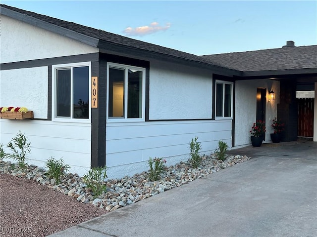 407 Tiger Lily Way, Henderson, NV 89015 - view of property exterior featuring a shingled roof and stucco siding
