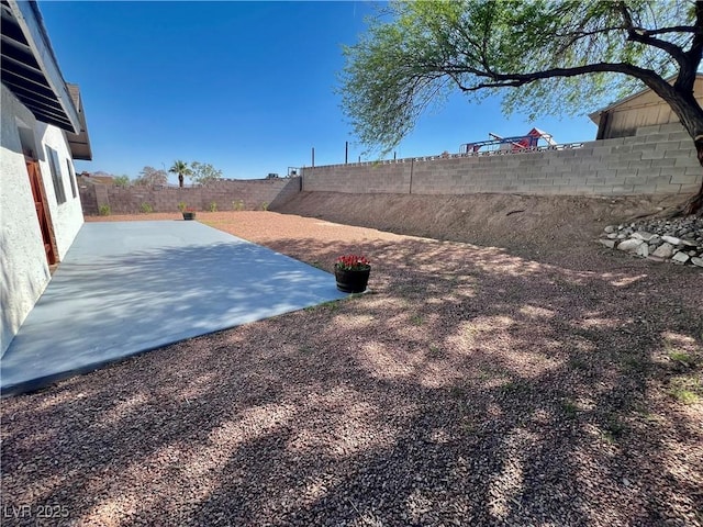 407 Tiger Lily Way, Henderson, NV 89015 - fenced backyard with a patio