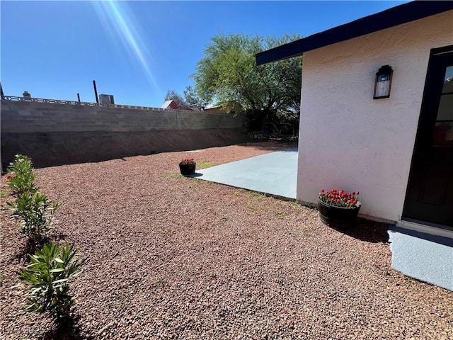 407 Tiger Lily Way, Henderson, NV 89015 - fenced backyard with a patio area