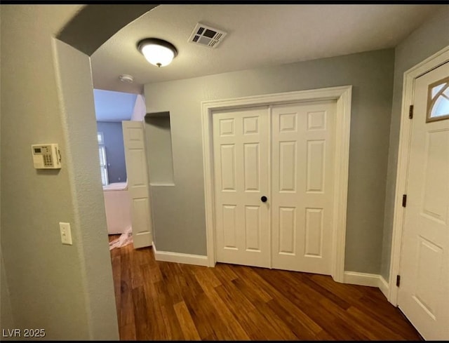 5165 Briar Meadow Way, Las Vegas, NV 89118 - foyer entrance featuring dark wood-type flooring, baseboards, and healthy amount of natural light
