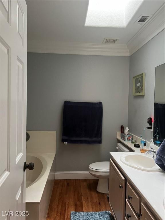 5165 Briar Meadow Way, Las Vegas, NV 89118 - full bathroom featuring crown molding, wood finished floors, a bath, toilet, and vanity