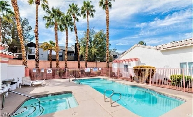5165 Briar Meadow Way, Las Vegas, NV 89118 - community pool with a patio area and fence