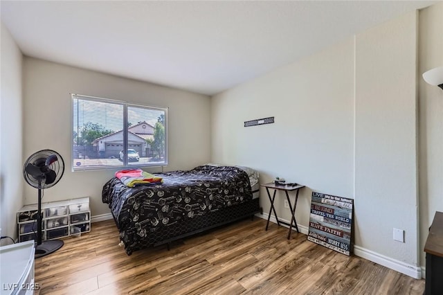 5502 Cinnamon Ave, Las Vegas, NV 89122 - bedroom featuring wood finished floors and baseboards