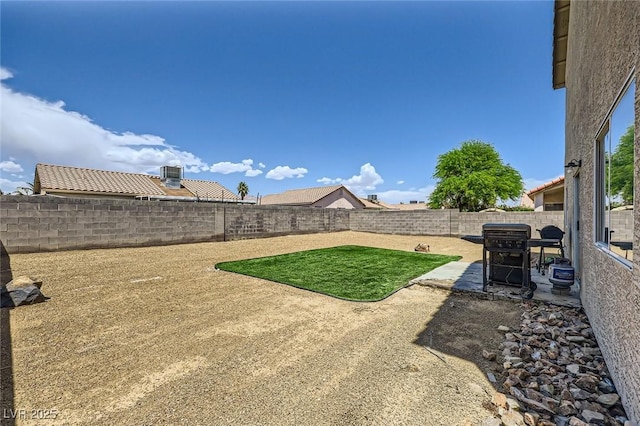 5502 Cinnamon Ave, Las Vegas, NV 89122 - fenced backyard featuring a patio