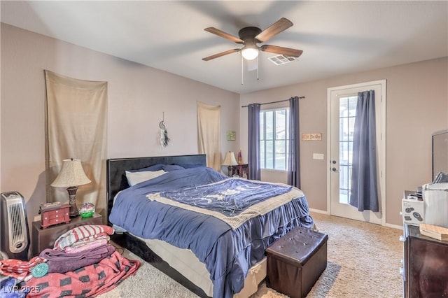 bedroom with carpet flooring, access to exterior, ceiling fan, and baseboards