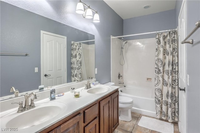 bathroom with shower / tub combo with curtain, tile patterned floors, toilet, and double vanity