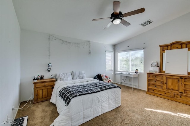 carpeted bedroom featuring vaulted ceiling and ceiling fan