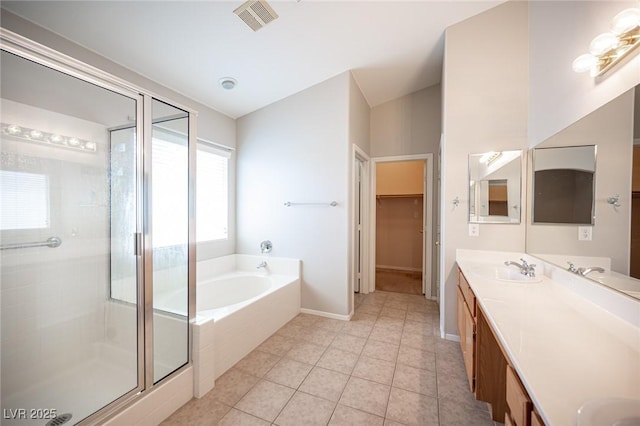 7500 Peaceful Brook St, Las Vegas, NV 89131 - full bath with a stall shower, a bath, tile patterned floors, double vanity, and lofted ceiling
