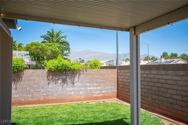 7500 Peaceful Brook St, Las Vegas, NV 89131 - fenced backyard featuring a mountain view