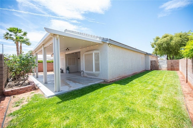 7500 Peaceful Brook St, Las Vegas, NV 89131 - back of property with a patio area and a ceiling fan