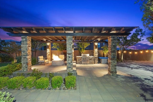 10470 Dove Meadow Way, Las Vegas, NV 89135 - view of patio / terrace featuring an outdoor kitchen and a pergola