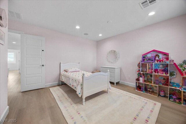 10470 Dove Meadow Way, Las Vegas, NV 89135 - bedroom with wood finished floors, baseboards, and recessed lighting