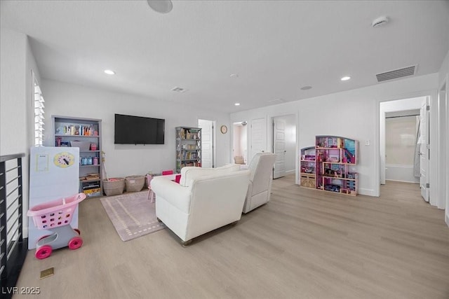 10470 Dove Meadow Way, Las Vegas, NV 89135 - living room featuring light wood-type flooring, recessed lighting, and baseboards