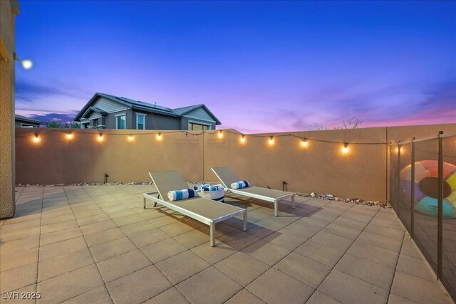 10470 Dove Meadow Way, Las Vegas, NV 89135 - fenced backyard with a patio area