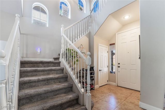 9513 Perennial View Ave, Las Vegas, NV 89148 - entryway featuring stairs, baseboards, and tile patterned flooring