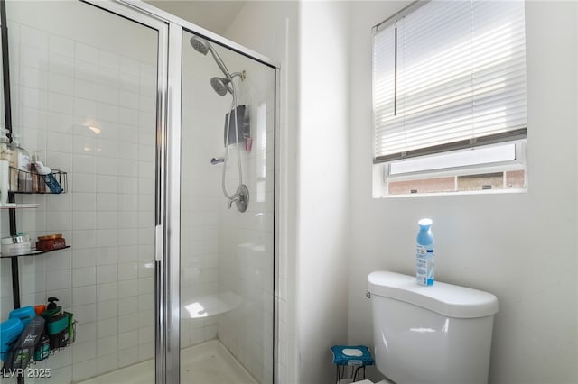 9513 Perennial View Ave, Las Vegas, NV 89148 - bathroom featuring a stall shower and toilet