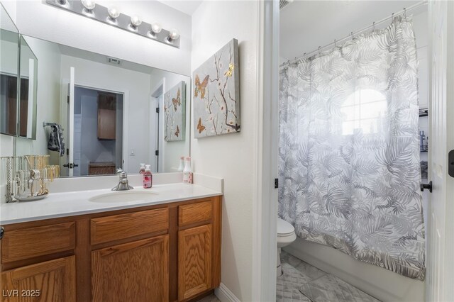 9513 Perennial View Ave, Las Vegas, NV 89148 - bathroom featuring marble finish flooring, toilet, vanity, and shower / tub combo with curtain