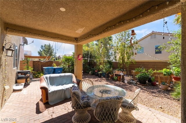 9513 Perennial View Ave, Las Vegas, NV 89148 - view of patio with a fenced backyard and outdoor dining space