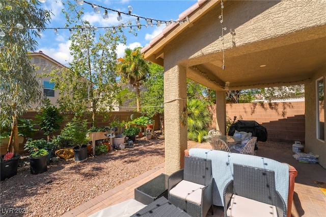 9513 Perennial View Ave, Las Vegas, NV 89148 - view of patio with outdoor dining area, a fenced backyard, and grilling area